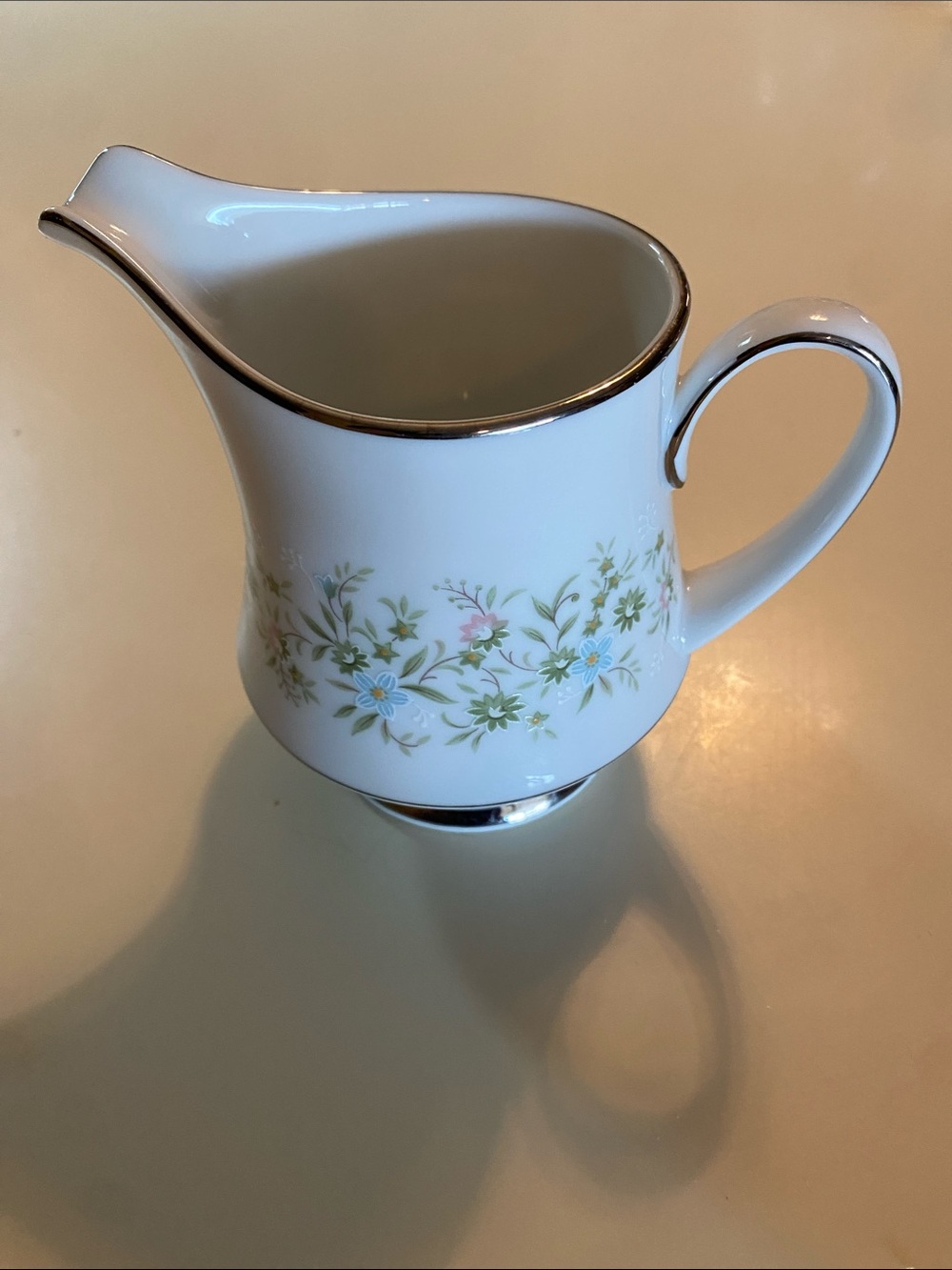 Noritake White Porcelain Floral Creamer with Silver Trim